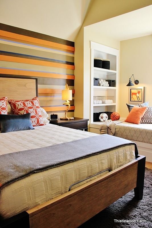 the wall treatment in this room. The wall was layered with pieces of wood and stripes of paint. It’s an easy effect you could create for under $100.